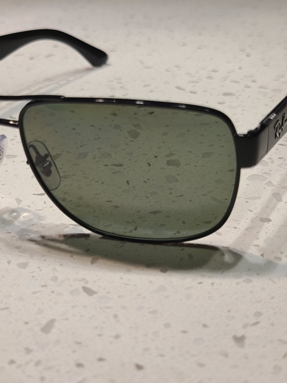 Ray-Ban Black Frame Sunglasses with Green Lenses